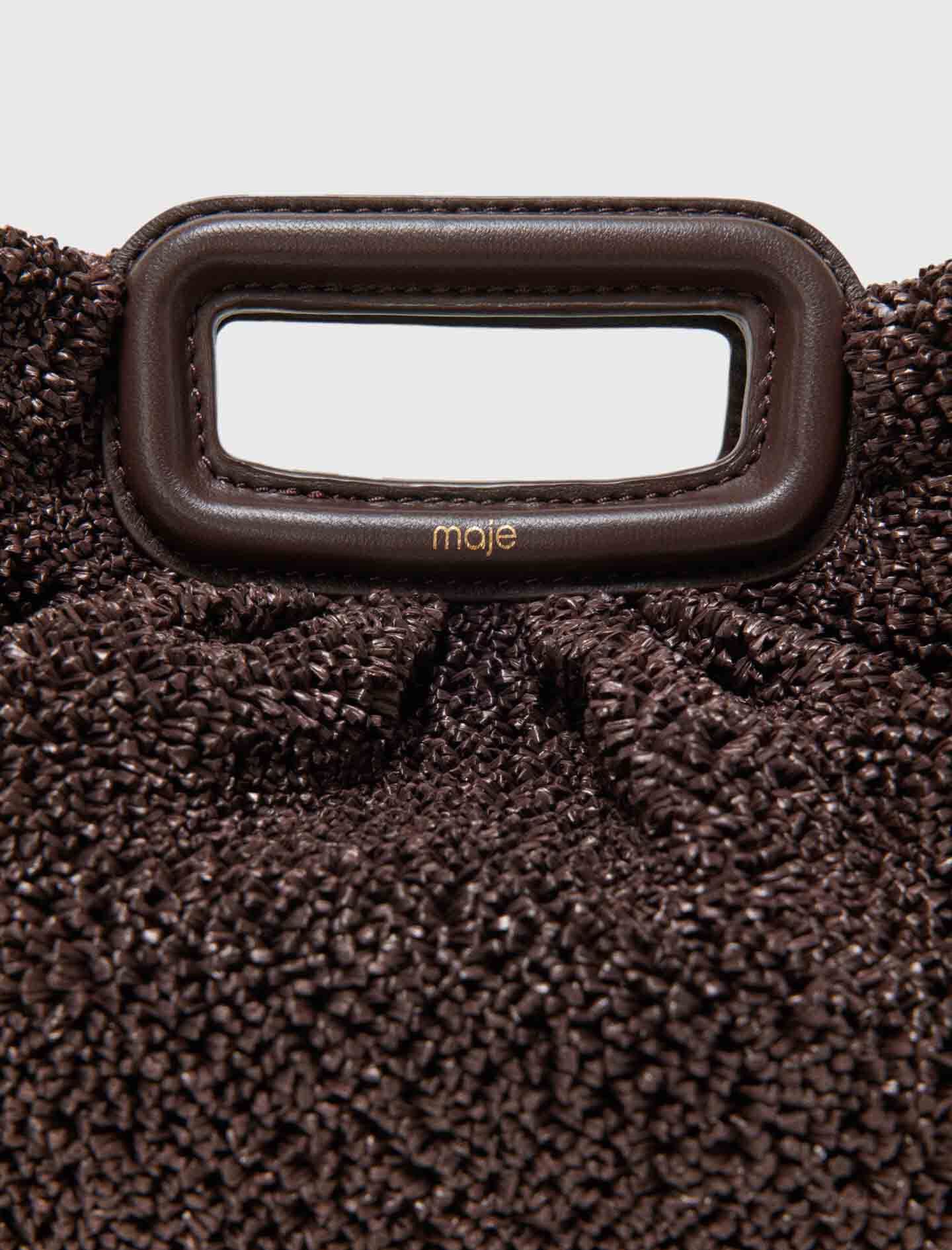 Maje Mipli bouclé effect clutch bag