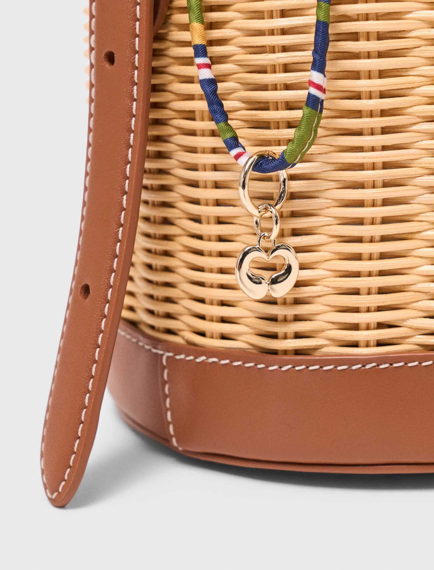 Maje Wicker basket with printed pouch