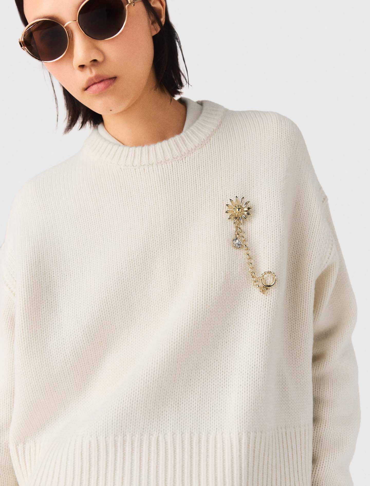 Maje Sweater with floral brooch