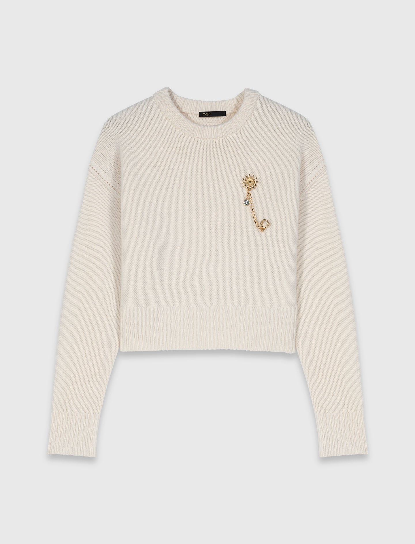 Maje Sweater with floral brooch