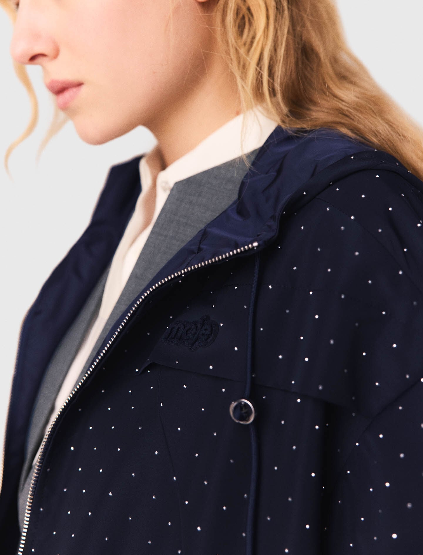 Maje Hooded windbreaker with rhinestones