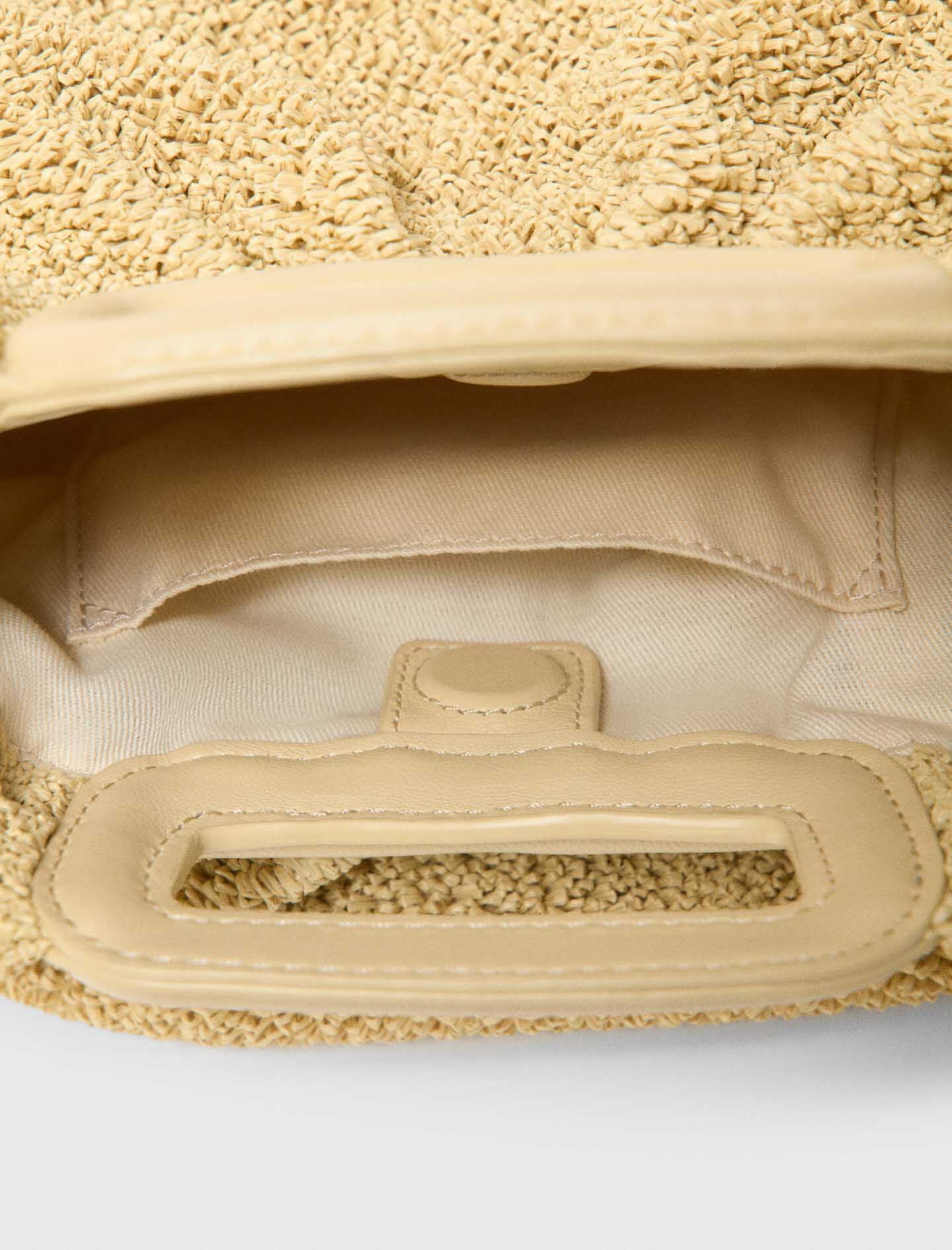 Maje Mipli bouclé effect clutch bag