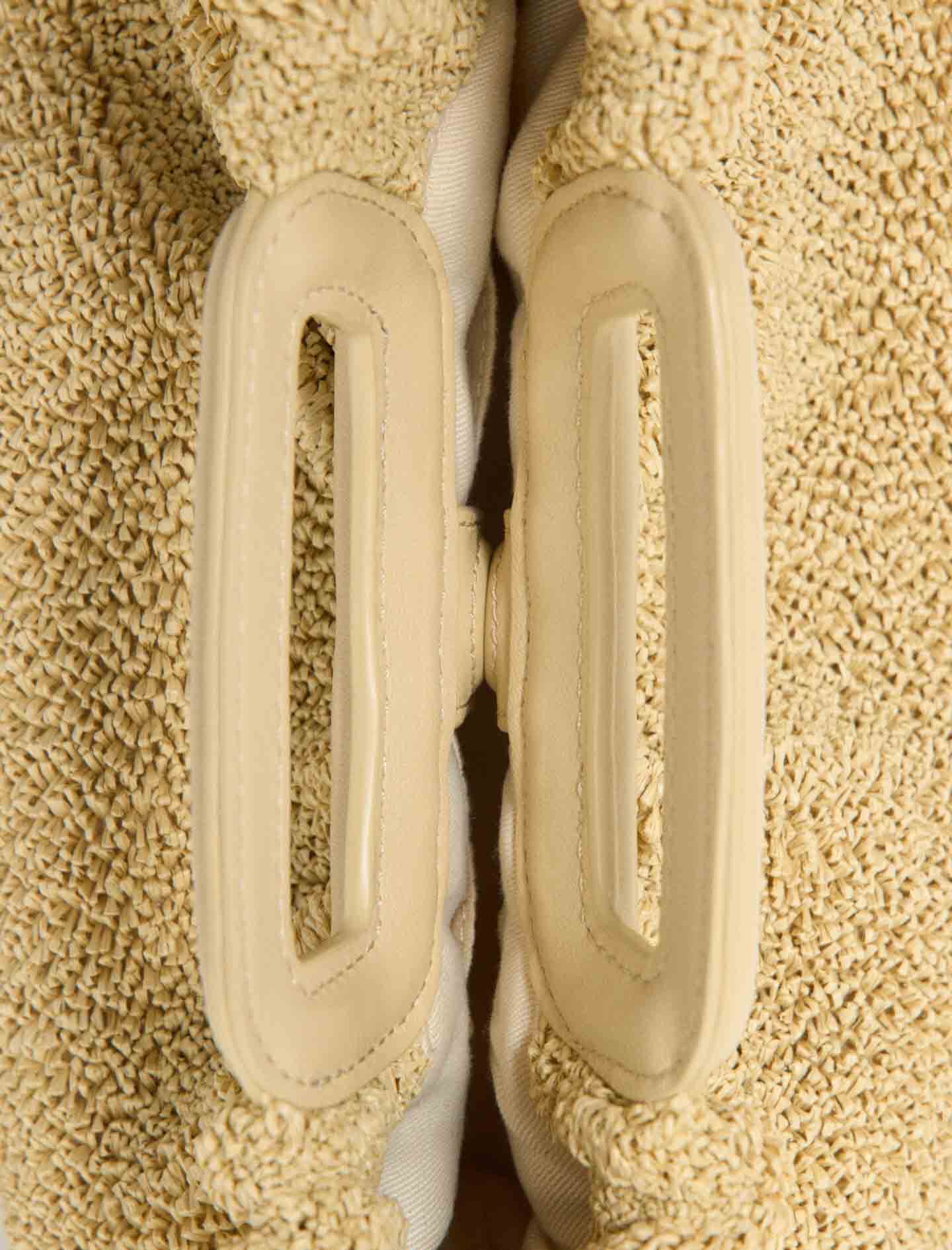 Maje Mipli bouclé effect clutch bag