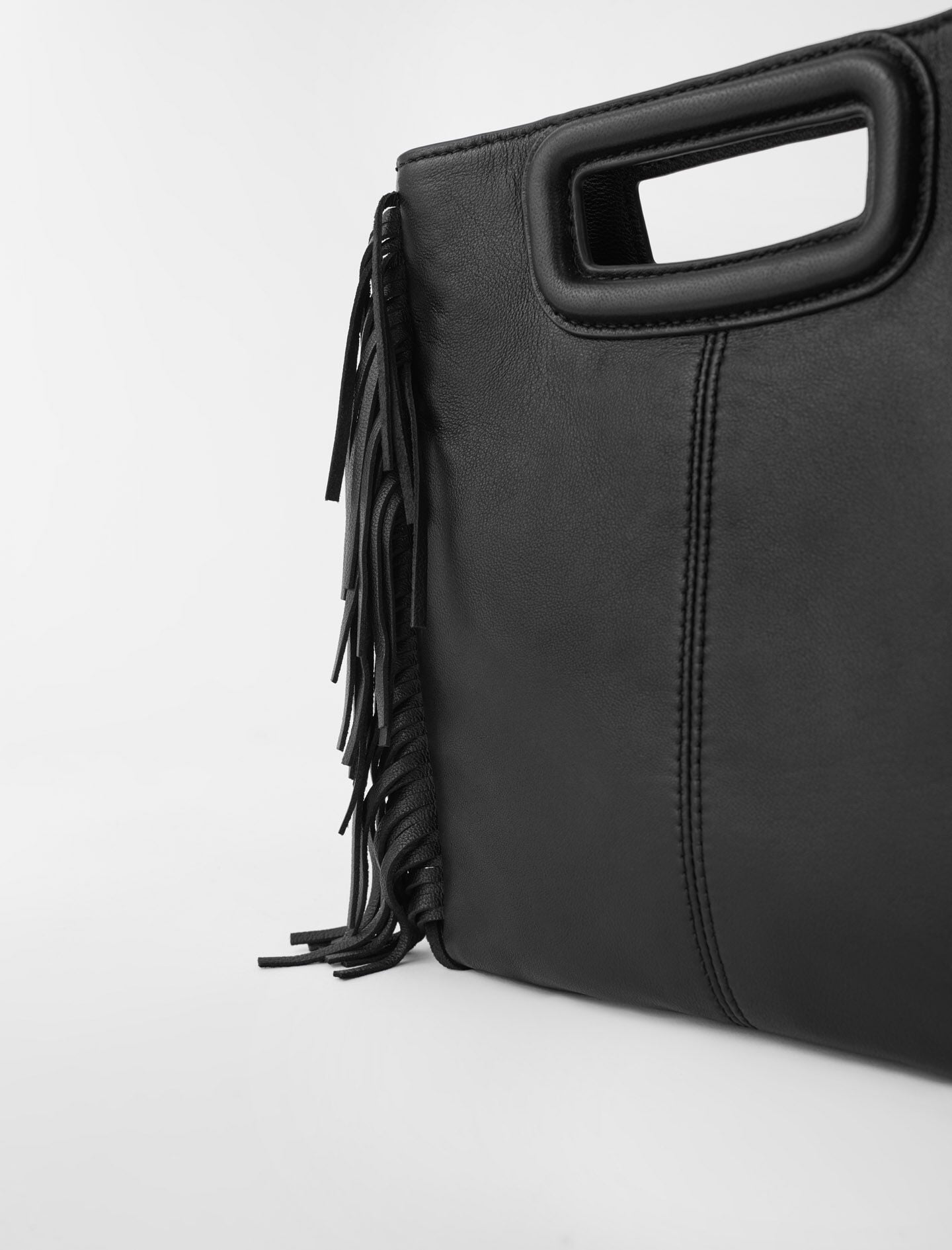 Maje Smooth leather M bag with fringing