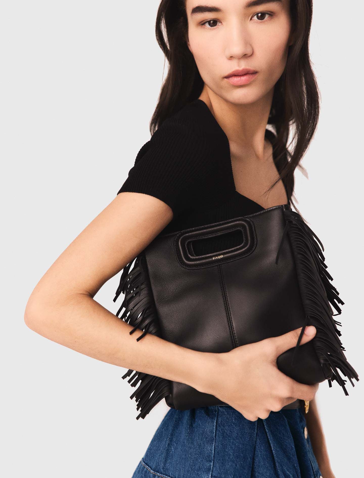 Maje Smooth leather M bag with fringing