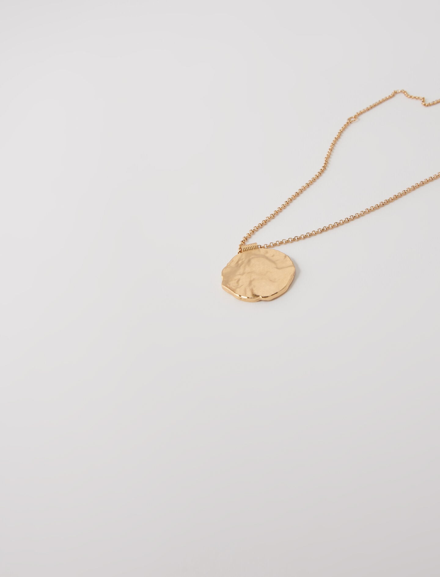 Maje Zodiac medal