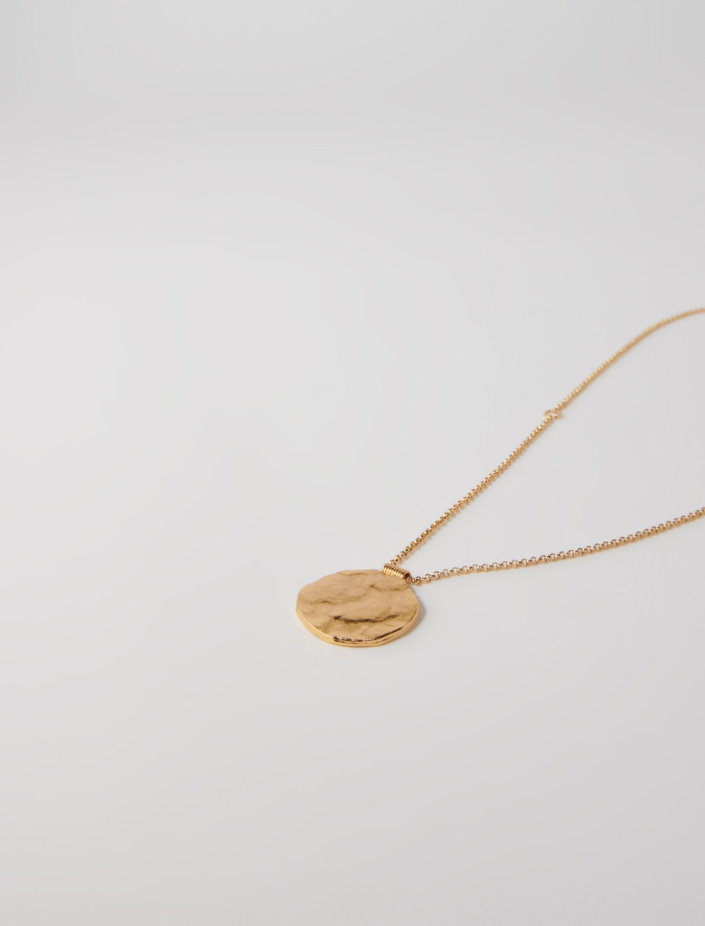 Maje Zodiac medal
